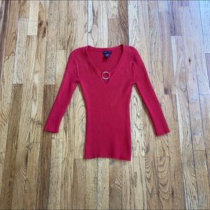 Red Sweater with silver circle. Size XS